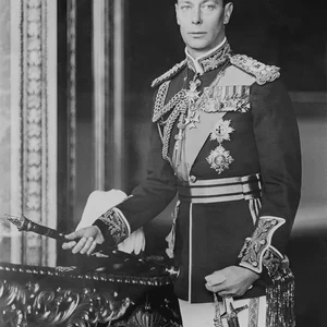 King George VI dies and Queen Elizabeth II becomes monarch